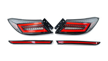 Load image into Gallery viewer, Intec Sequential LED 4pc Taillights w/Center Bar (Clear lens/Black Base/Red Bar) - 2022-2024 Toyota GR86 / Subaru BRZ