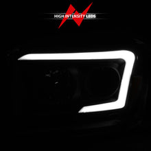 Load image into Gallery viewer, ANZO 06-09 Dodge RAM 1500/2500/3500 Headlights Black Housing/Clear Lens (w/ Light Bars)