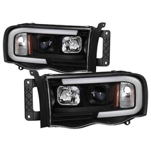 Load image into Gallery viewer, Spyder 02-05 Dodge Ram 1500 Light Bar Projector Headlights - Black (PRO-YD-DR02V2-LB-BK)