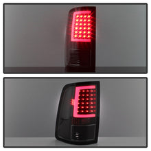 Load image into Gallery viewer, xTune 09-18 Dodge Ram 1500 LED Tail Lights - Black Smoke (ALT-ON-DR09-LBLED-BSM)