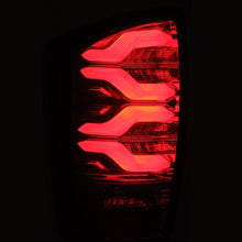 Load image into Gallery viewer, AlphaRex 16-21 Toyota Tacoma PRO-Series LED Tail Lights Jet Black