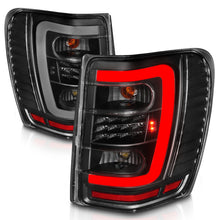 Load image into Gallery viewer, ANZO 1999-2004 Jeep Grand Cherokee LED Tail Lights w/ Light Bar Black Housing Clear Lens